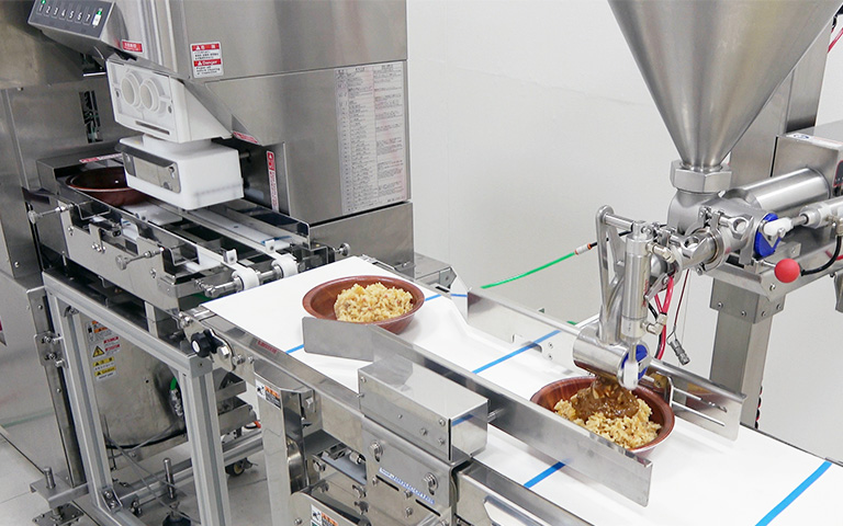 Proposal for a Two-Person Labor-Saving System for Serving Rice from Pre-Packaged Containers